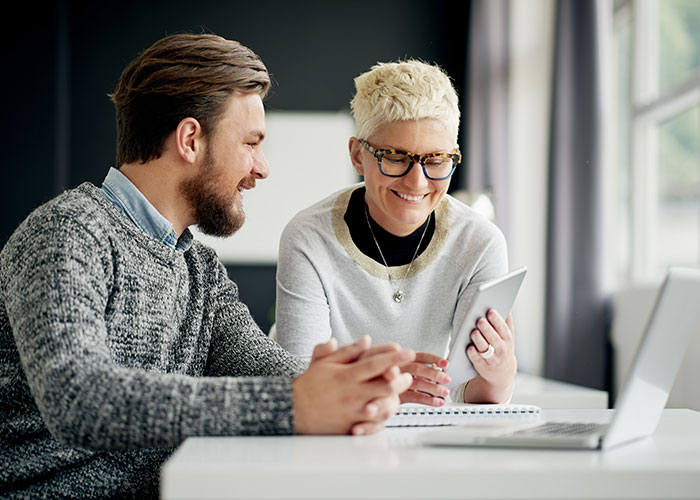 Coworkers on a notepad