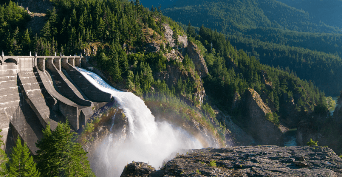 water flowing through a dam