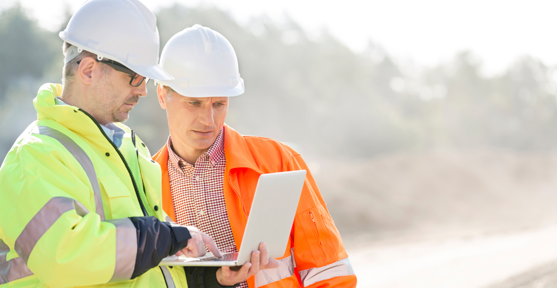 construction manager working with architect on a construction site