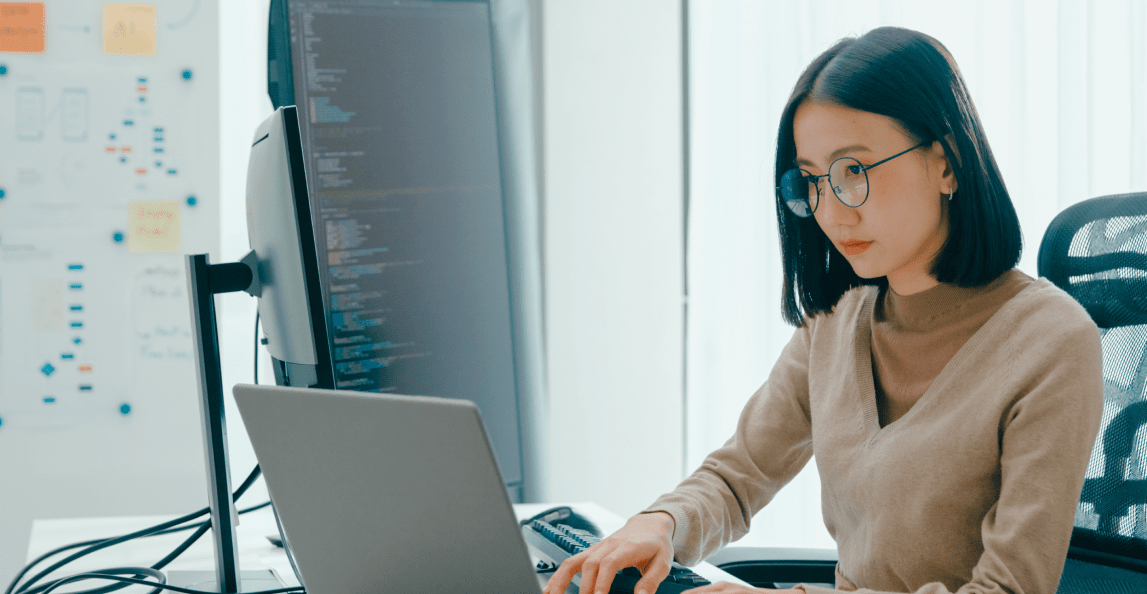 Professional working at a computer workstation