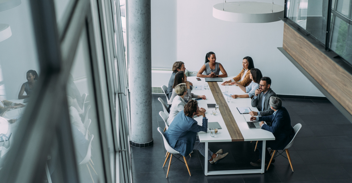Business team in a strategic planning meeting in a modern office boardroom