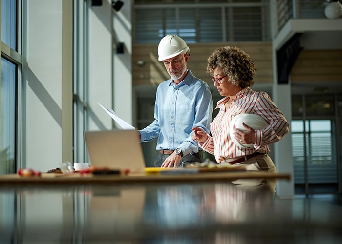 architects working on laptop