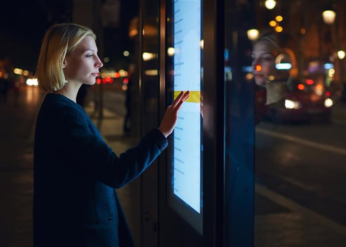 Female viewing an illuminated screen