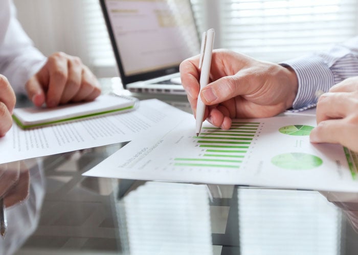 1:31 PMClaude responded: Business Professionals Analyzing Financial Charts and Performance Reports in Team MeetingBusiness Professionals Analyzing Financial Charts and Performance Reports in Team Meeting