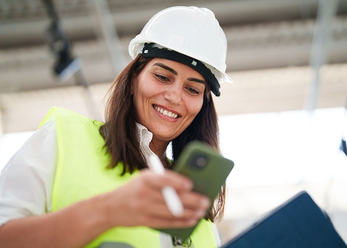 Women Architect Using Mobile 