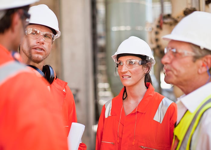 Workers talking on a construction site