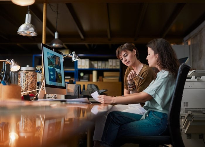 Coworkers working on reports