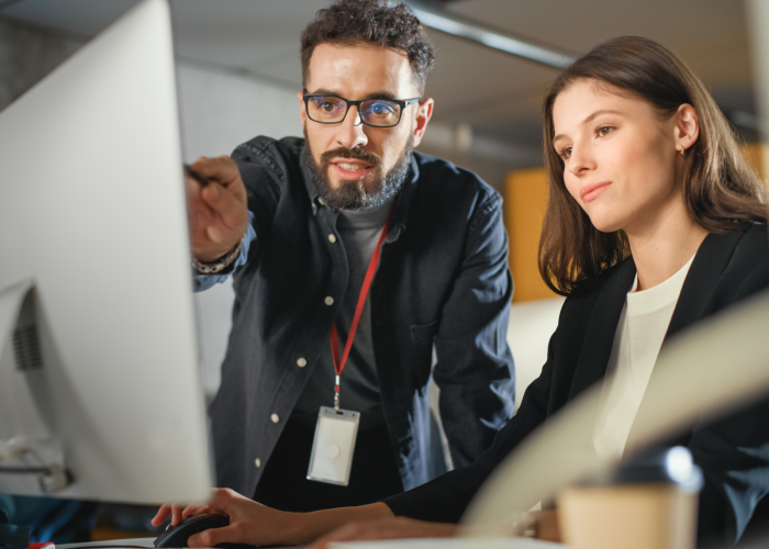 two employee discussing with computer 
