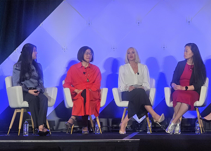 Female Industry Leaders Participating in AIA Conference Panel Discussion on Stage