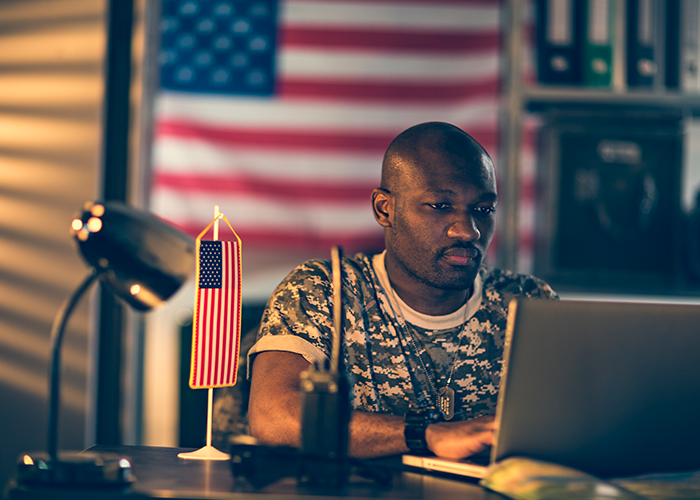 American Soldier Using Laptop