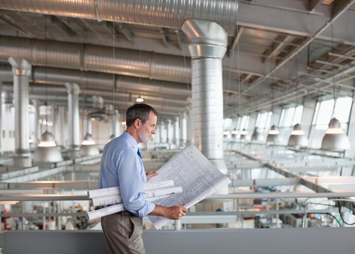Architect Viewing Blueprints