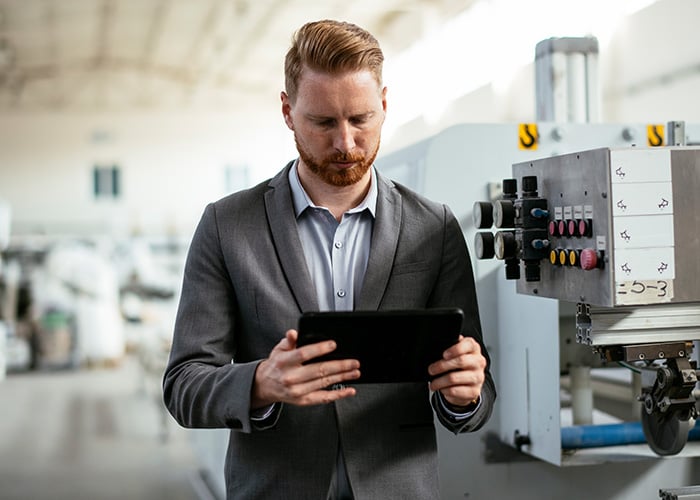 businessman in factory
