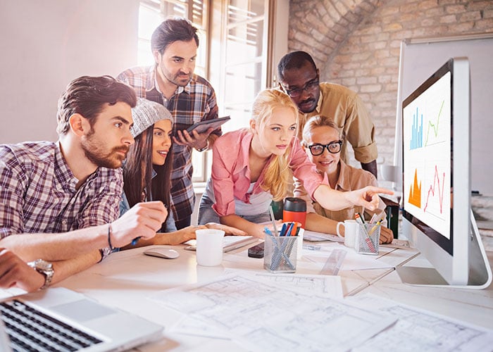 A group of people discussing a project