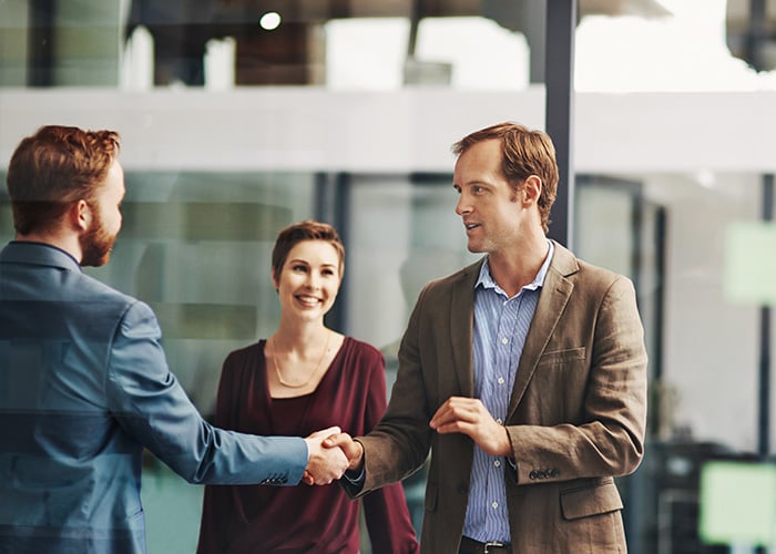 closing a deal with a firm handshake
