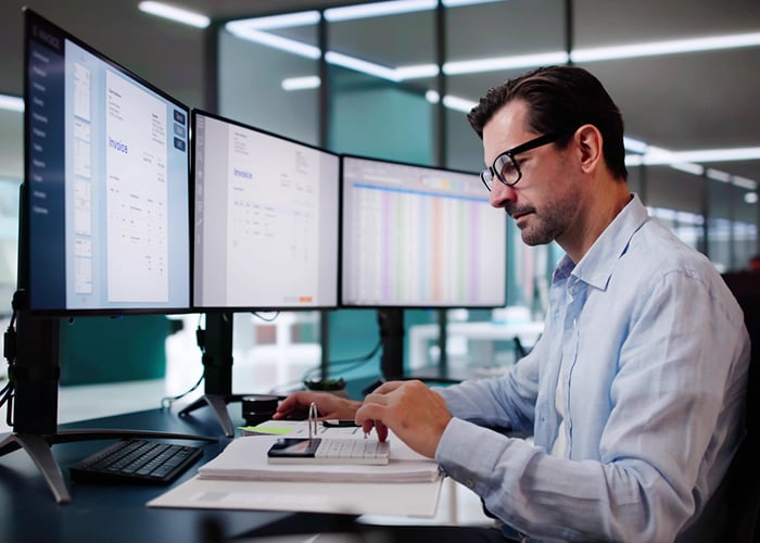 Accountant reviewing a digital e-invoice