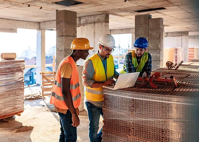 Engineer Architect and business man working on the engineering at construction site