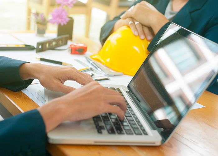 Female architects working on a laptop