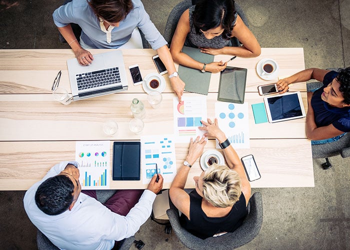 Group of people discussing a project