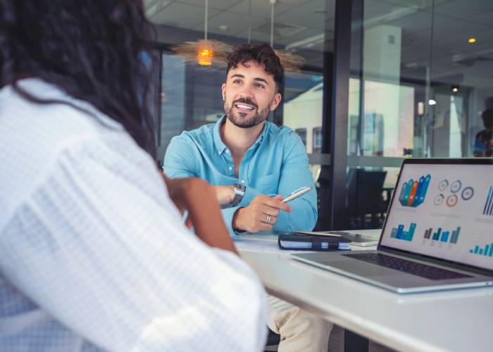 Business Consultant Presenting Data Insights to Client