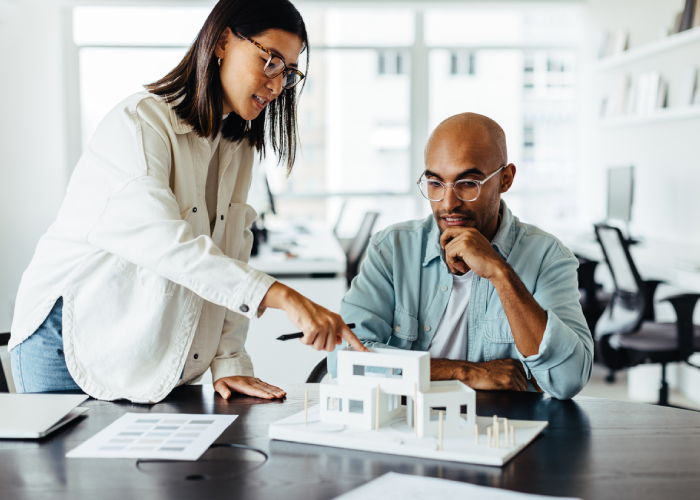 Two colleagues discussing a project.
