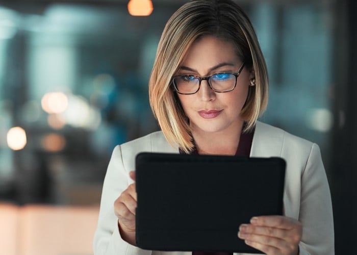 Woman viewing content on a tablet