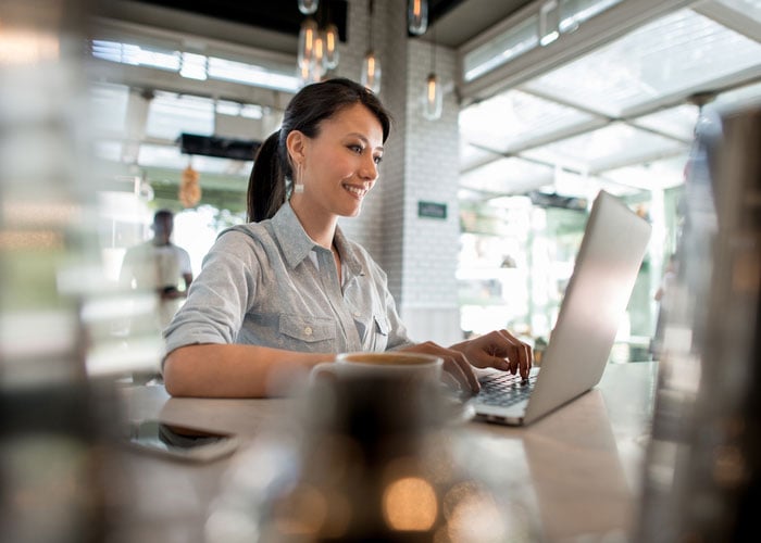 woman working on her laptop