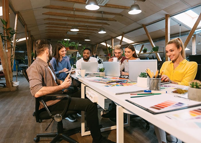 Young designers working in a modern office